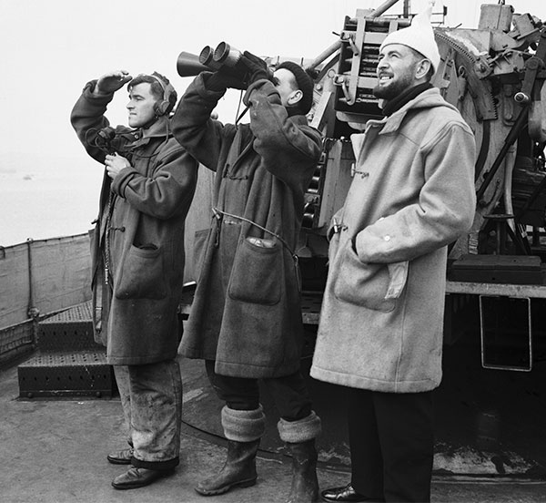 Soldiers in duffle coats