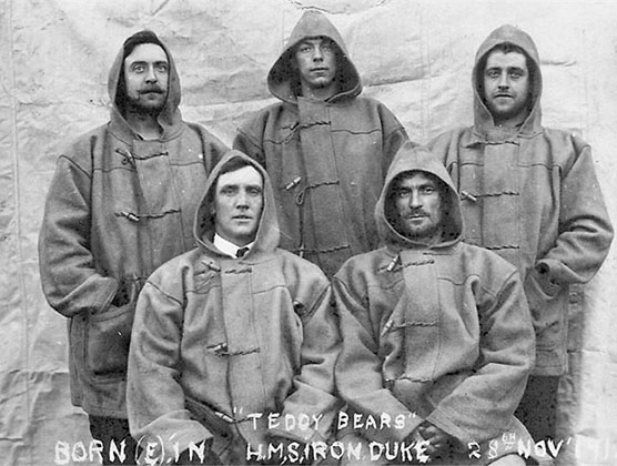 Members of the Teddy Bears in duffle coats 